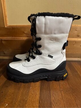 UGG waterproof women’s black boots size 8.5 and can be folded over brand new